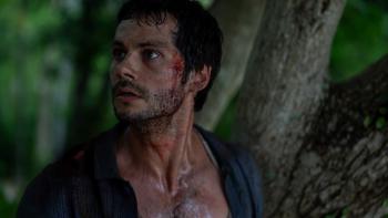 Send Help Movie: Bradley Preston (Dylan O'Brien), bloody and grimy, looks startled