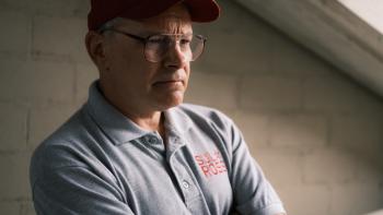 The Senior Movie: Coach Sam Weston (Rob Corddry) frowns slightly and looks thoughtfully at something