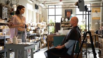 Seven Veils movie: Rebecca Lilliard stands across from a seated Michael Kupfer-Radecky in the prop department