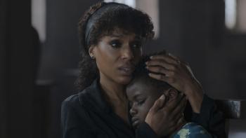 Shadow Force Movie: A visibly touched Kyrah (Kerry Washington) cradles her son Ky's head on her chest