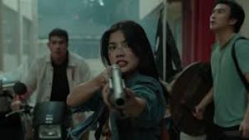 Shake Rattle & Roll Extreme: Asian woman aims gun