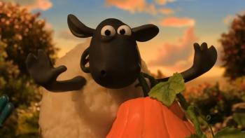 Shaun the Sheep—The Beast of Mossy Bottom: Sheep with pumpkin at sunset, trees in background