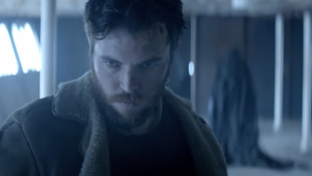 Shepherd movie: Tom Hughes looking down