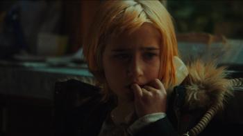 She Rides Shotgun Movie: Eleven year-old Polly chews her fingers while nervously talking on the phone