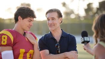 Sidelined 2: Intercepted movie: USC QB Drayton Lahey (Noah Beck) and his dad (James Van Der Beek) are interviewed by a sports reporter