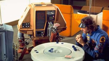 Silent Running: Bruce Dern sits at a table playing cards with a robot drone