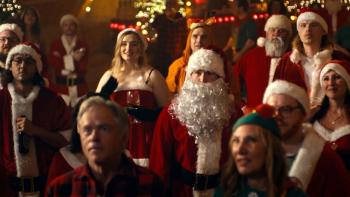 Silent Night, Deadly Night Movie: Dressed as Santa Claus, Billy stands among of several others wearing Santa gear