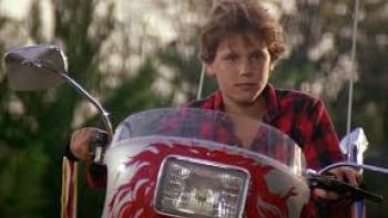 Silver Bullet movie: White boy on bike closeup