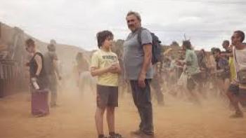 Sirāt: Father and son at rave.