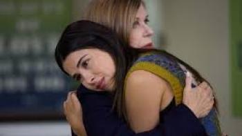 Sisterhood, Inc. Daniella Monet and Rachel Leigh Cook embrace