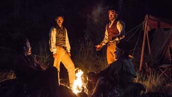 The Sisters Brothers Movie: Eli Sisters, Hermann Warm, John Morris, and Charlie Sisters around the campire