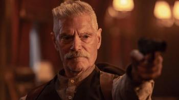 Sisu: Road to Revenge Movie: Draganov (Stephen Lang) grimly points a gun at someone out of frame