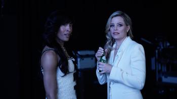 Skincare movie: MJ Rodriguez and Elizabeth Banks look at something off screen