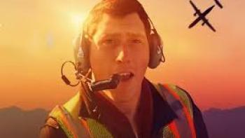 #Skyking movie: Richard Russell stares open mouthed with pilot headset on as a plane nosedives behind him