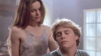 Sleepwalkers Movie: White young man sits as his mother stands by