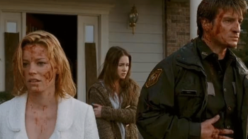 Slither movie: Starla, Bill, and Kylie with blood on their faces looking traumatized leaving a house