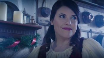 Snow White's Christmas Adventure: A woman with dark hair smiles