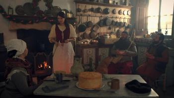 Snow White's Christmas Adventure: Snow White sits with her friends in a cabin