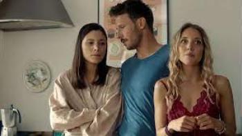 Squared Love Everlasting Scene 2: A woman and man look unhappy and another woman stands by
