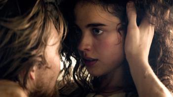 Stars at Noon: Close-up of Joe Alwyn and Margaret Qualley staring into each other's eyes.