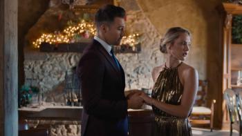 Stars Fell Again Movie: James Maslow faces and holds the hands of Ciara Hanna while she looks the other direction, indicating she's being pulled away