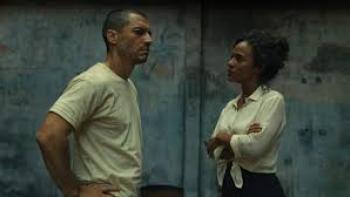 State of Fear movie: A Brazilian man and woman in white shirts face off