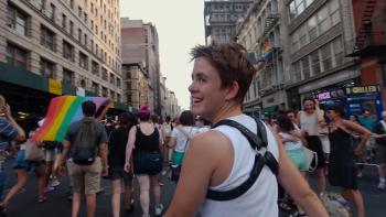 Skateboard pro Leo Baker at LGBTQ+ Pride march.