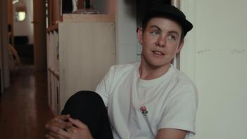 Skateboard pro Leo Baker wearing white T-shirt.