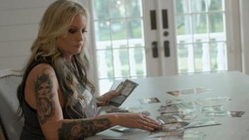 Stormy: Stormy Daniels at a table.