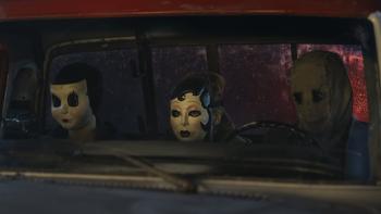The Strangers: Chapter 3 Movie: "Dollface," "Pin-Up Girl," and "Scarecrow" sit in the front seat of a truck on the road