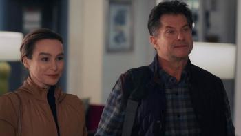 Stream Movie: Elaine (Danielle Harris) and Roy Keenan (Charles Edwin Powell) smile pleasantly as they check into a resort