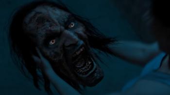 Stree 2: A giant severed head of a monster grotesquely screams at a woman who is off-screen