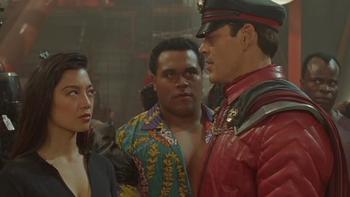 Street Fighter: Chun-li looks distrustfully at Bison while Honda looks on