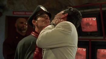 Street Fighter: Bison lifts Dr. Dhalsim by the throat