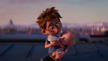 Super-Charlie: Willie feeds his baby brother, Charlie, with a bottle