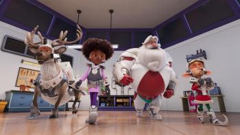 SuperClaus movie: Animated characters stand in a super formation with a superhero Santa Claus