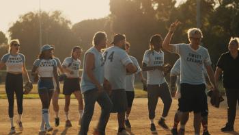 Sweet Dreams: Johnny Knoxville holds a victory sign while walking off the field with his adult softball team at sunset