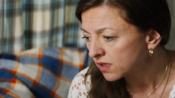 Sweetheart: Jo Hartley sits on sofa