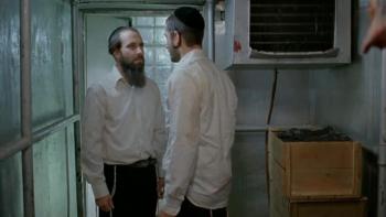 Eyes Wide Open: Two Orthodox Jewish men stare at each other