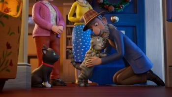 Tabby McTat: A heartwarming reunion as a gray tabby cat hugs a bearded busker at a doorstep, while a black cat and two women next to them