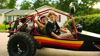 Tapawingo movie: Jon Heder, Jay Pichardo, and Sawyer Willams sit looking out of a 4x4 dune buggy car