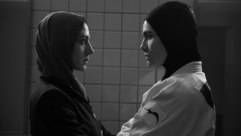 Tatami movie: Maryam (Zar Amir Ebrahimi) and Leila (Arienne Mandi) stare each other down