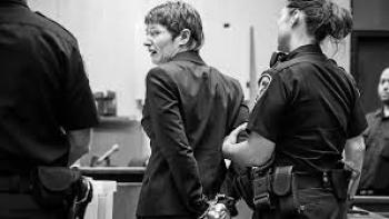 Tell Them You Love Me: Women in cuffs in courtroom