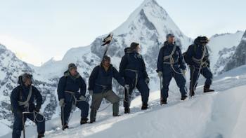 Tenzing: Climbers ascend in a line.