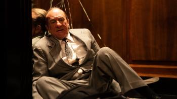 The Alto Knights movie: Robert De Niro is crumpled in an elevator with a bloody head wound