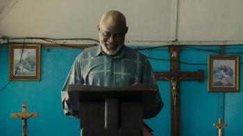 The Black Book: Paul preaches in his church. 
