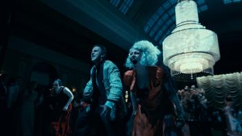 The Bride! Movie: Christian Bale as Frank and Jessie Buckley as The Bride scream and dance in a nightclub