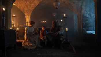 The Death of Robin Hood movie: Jodie Comer, Faith Delaney, and Hugh Jackson eat soup on a priory floor