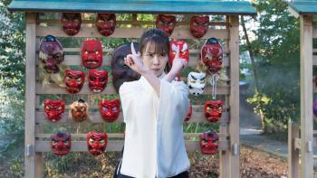 The Divine Protector - Master Salt Begins movie screenshot 3: Master Salt stands in front of mask display, makes banishment hand signal.