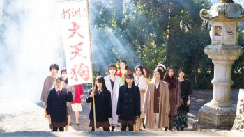 The Divine Protector - Master Salt Begins movie screenshot 4: Teen girls lead a group of unhappy women into a shrine.
